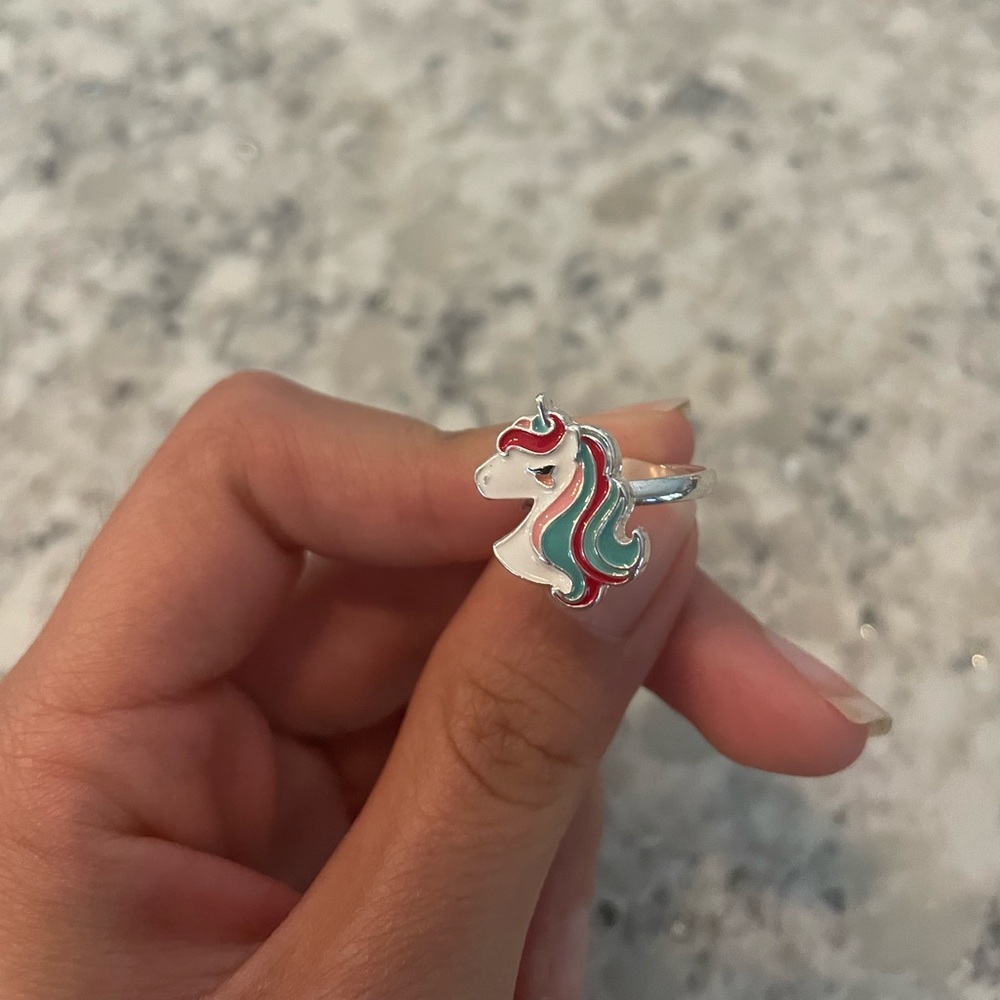 Claire’s colorful unicorn ring